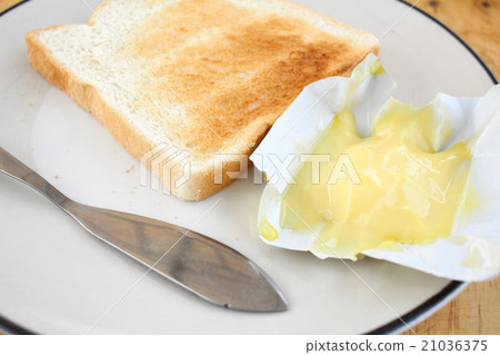Slice toast bread with butter Slice toast bread with butter 21036375