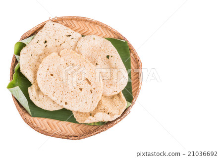 Freshy fried delicious fish crackers on tray Freshy fried delicious fish crackers on tray 21036692