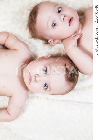 Two beautiful twins baby 21040946