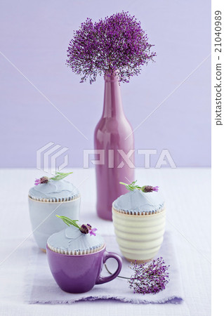 Decorated yellow cupcakes Decorated yellow cupcakes 21040989