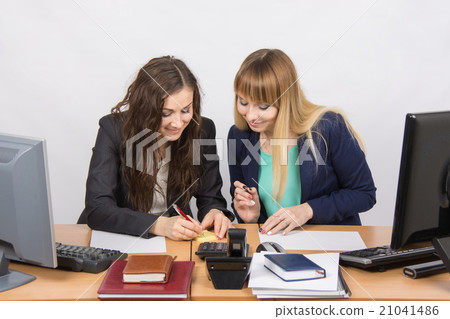 Employees of the office fun writing something on paper for notes 21041486