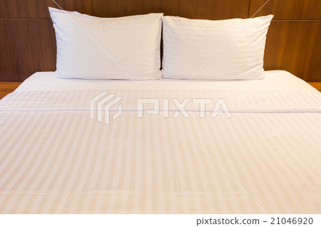 White bed sheets and pillows 21046920