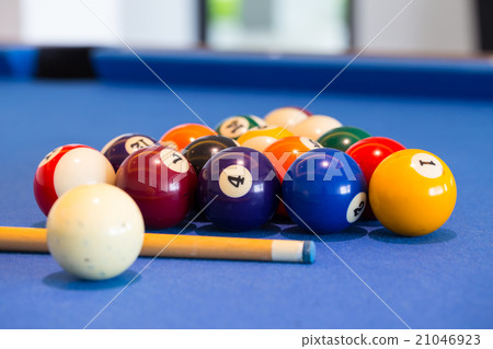 Billiard ball on blue table 21046923