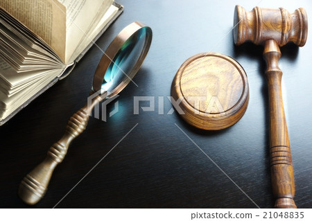 Judges Gavel, Magnifier And Old Book On The Table 21048835