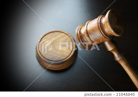 Judges Or Auctioneers Walnut Gavel On The Table 21048840