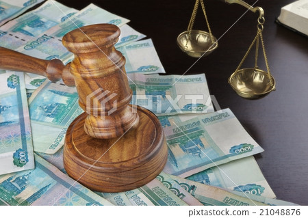 Judges Gavel, Scale, Old Book And Cash On Table Judges Gavel, Scale, Old Book And Cash On Table 21048876