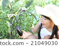 A girl playing a home garden 21049030
