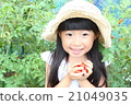 A girl playing a home garden 21049035