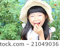 A girl playing a home garden 21049036