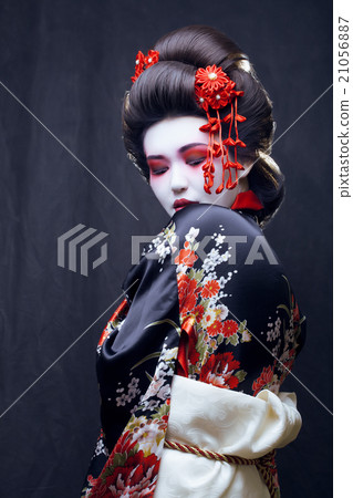 young pretty geisha in kimono with sakura and 21056887
