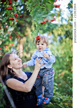 Mother and Son Having Fun in the forest 21063944