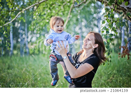Mother and Son Having Fun in the forest Mother and Son Having Fun in the forest 21064139