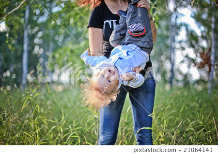 Mother and Son Having Fun in the forest Mother and Son Having Fun in the forest 21064141