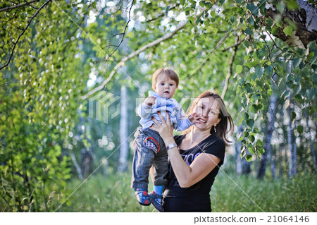 Mother and Son Having Fun in the forest Mother and Son Having Fun in the forest 21064146