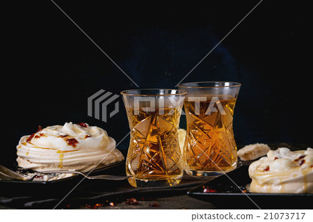 Pavlova dessert with caramel 21073717