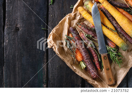 Colorful raw carrots Colorful raw carrots 21073782