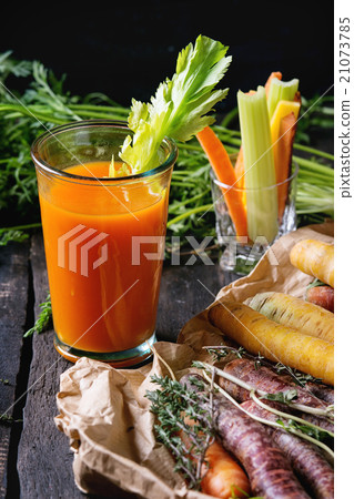 Colorful carrots and juice Colorful carrots and juice 21073785