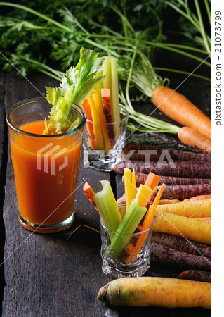 Colorful carrots and juice Colorful carrots and juice 21073799