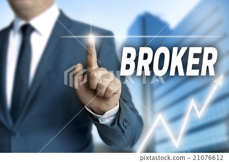 Broker touchscreen is operated by businessman 21076612