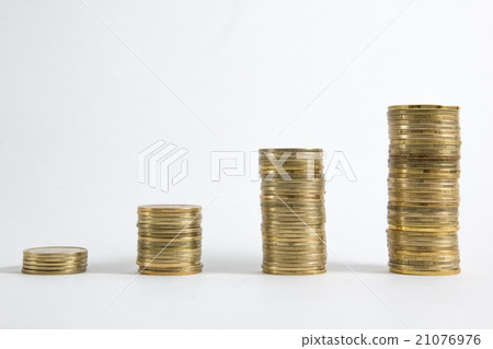 Columns of golden and silver coins isolated on 21076976