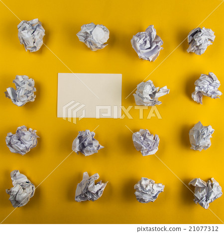 Crumpled paper balls and blank sheet of paper with Crumpled paper balls and blank sheet of paper with 21077312