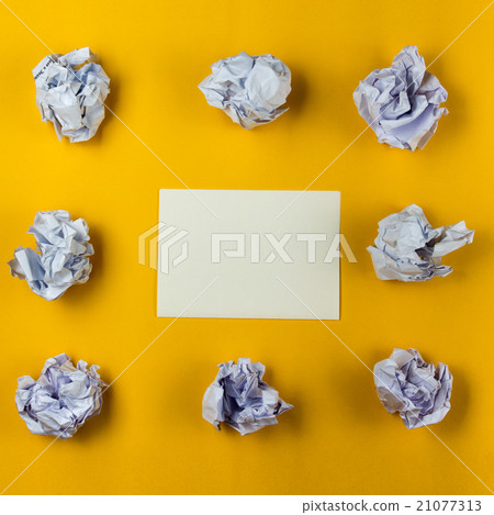 Crumpled paper balls and blank sheet of paper with Crumpled paper balls and blank sheet of paper with 21077313