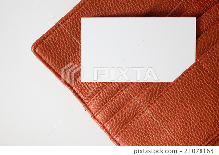 Business card in wallet isolated on white 21078163