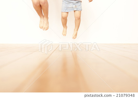 Two children 's legs 21079348
