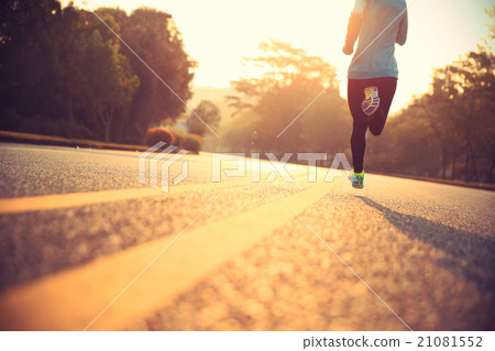 young fitness woman runner athlete running at road 21081552