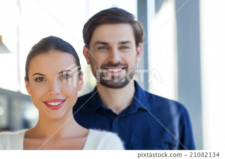 Skillful two workers are evincing positive 21082134