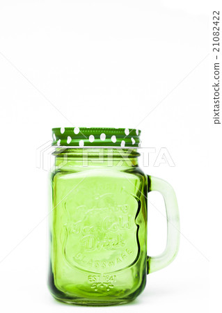 Green mason glass on white background Green mason glass on white background 21082422