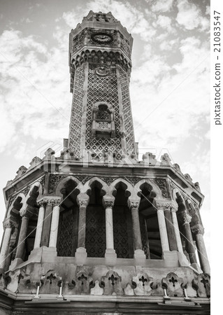 Izmir. Historical clock tower under cloudy sky Izmir. Historical clock tower under cloudy sky 21083547