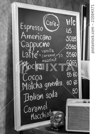 Beverage coffee menu on the blackboard. 21084371