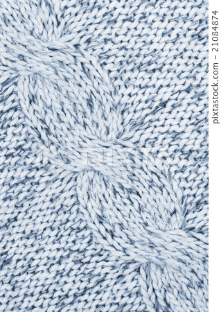Grey knitted textured as background Grey knitted textured as background 21084874