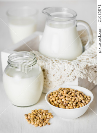 Soy milk in a glass and jar Soy milk in a glass and jar 21085071