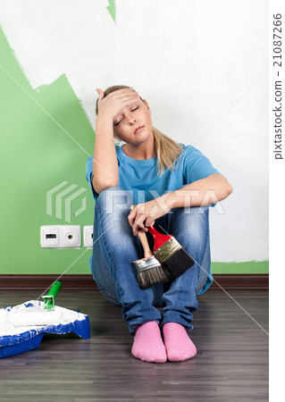 Tired woman  with paint tools 21087266