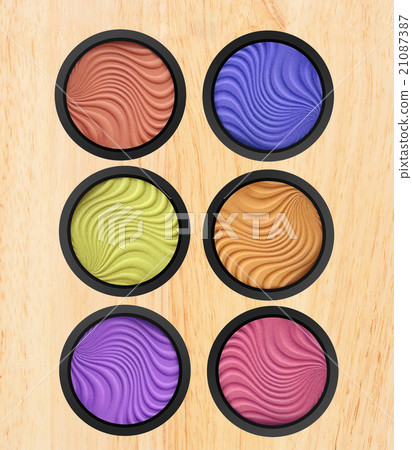 makeup eyeshadow on wooden background 21087387