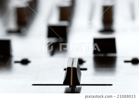 Crossfader on dj mixer in club Crossfader on dj mixer in club 21088013