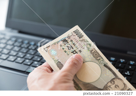 10,000日元的賬單和電腦黑背 21090327