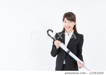 Business woman umbrella 21091049