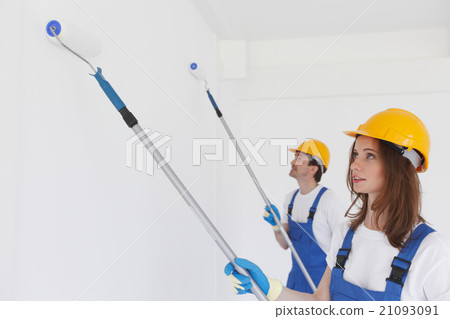 Workers painting wall Workers painting wall 21093091