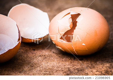 Broken egg isolated on white background Broken egg isolated on white background 21096905