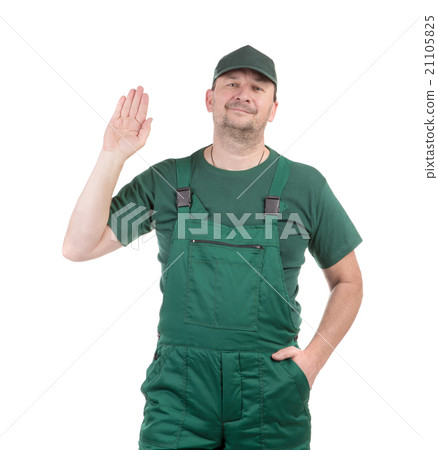 Worker in green overalls. Worker in green overalls. 21105825