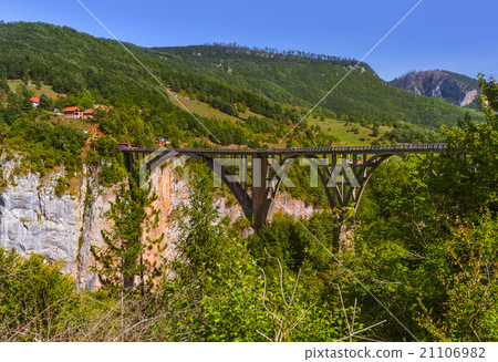 Bridge Durdevica in River Tara canyon - Montenegro Bridge Durdevica in River Tara canyon - Montenegro 21106982