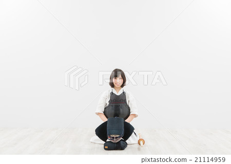 A woman who plays kendo A woman who plays kendo 21114959
