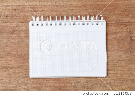 Open notebook on wooden background Open notebook on wooden background 21115098