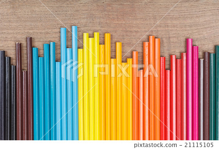 Color pencils on wooden background Color pencils on wooden background 21115105