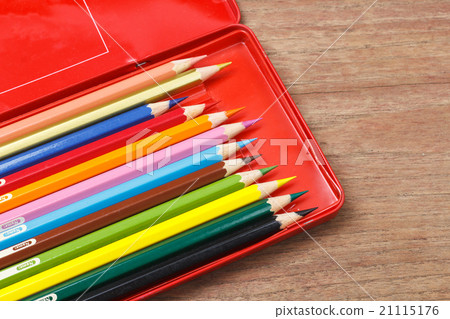 Close up of color pencils in pencil case on white background Close up of color pencils in pencil case on white background 21115176