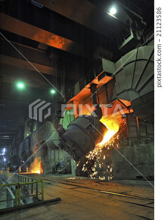 Molten hot steel pouring 21123586