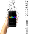 Hand holding smart phone with music notes 21123867